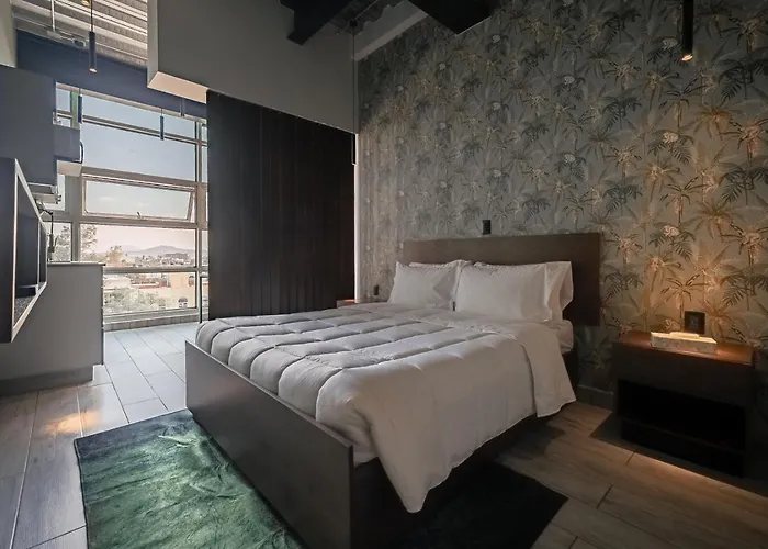 The Jungle Loft Tropical Comfort-centric W/kitchen