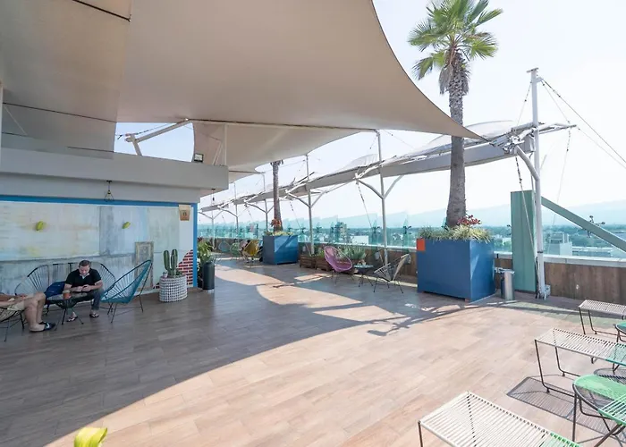 The Jungle Loft Tropical Comfort-centric W/kitchen *
